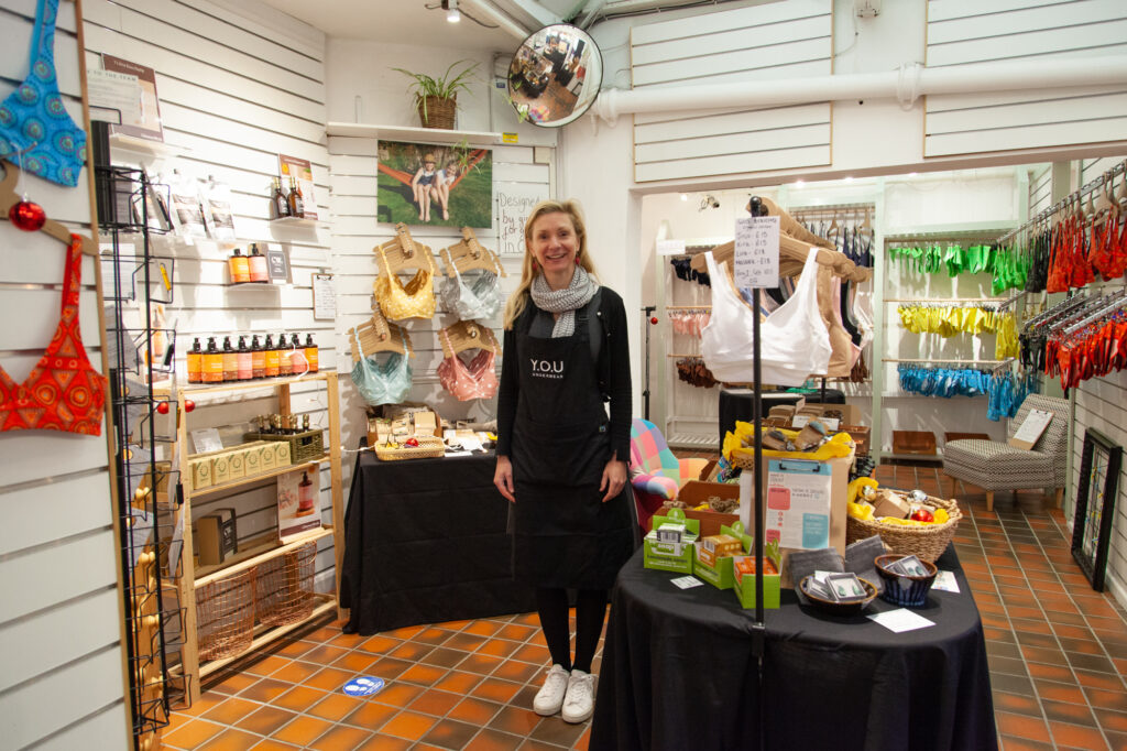 Photograph of YOU Underwear Founder Sarah Jordan in unit at The Covered Market