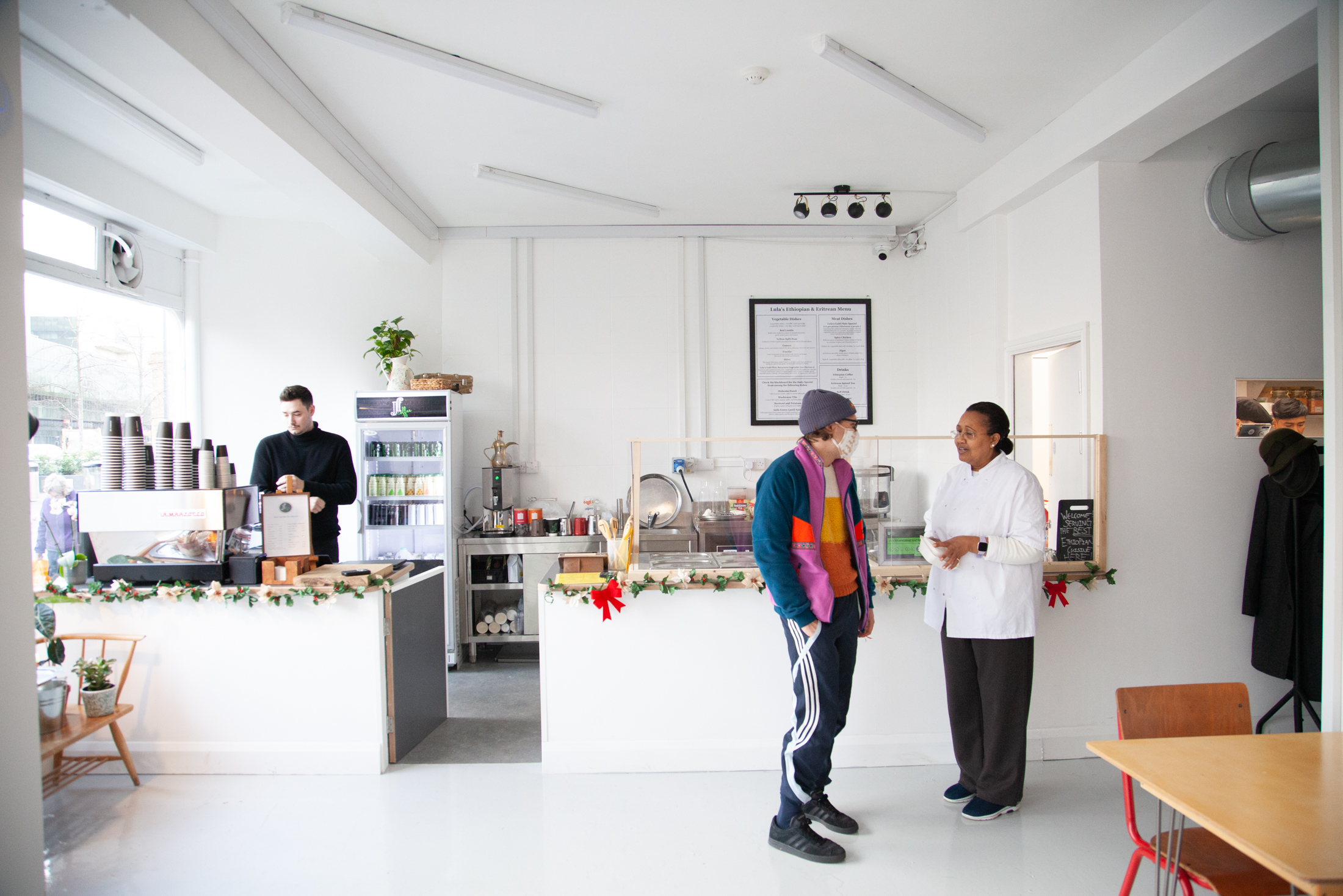 An interior photograph of a cafe service area at The Community Works