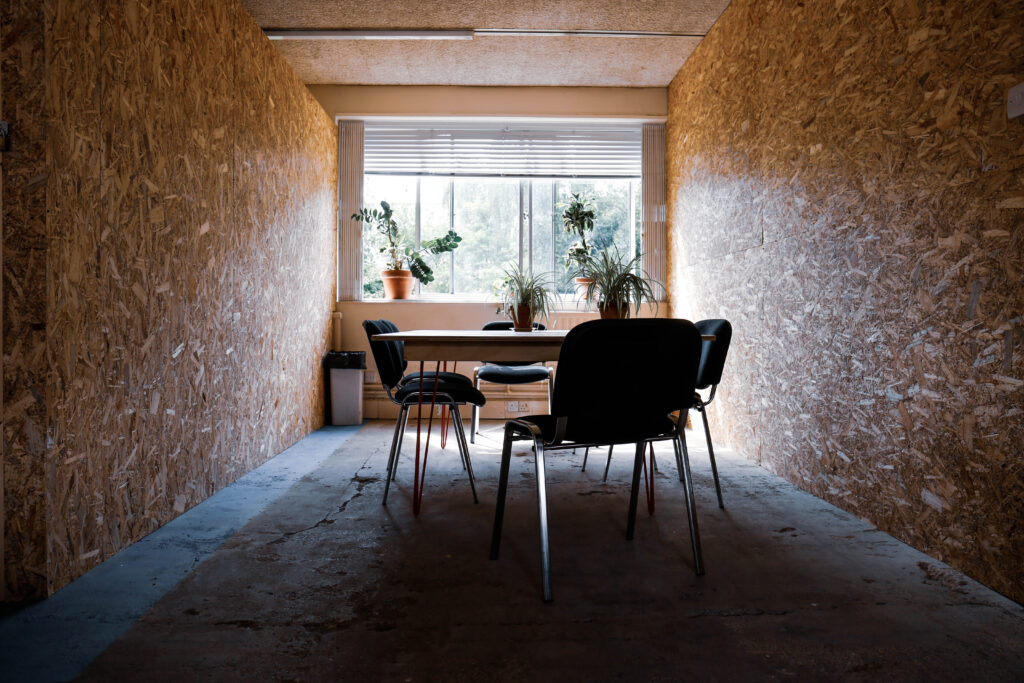 Seats around the meeting room table at Aristotle Lane Makespace Oxford