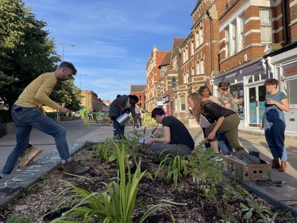 A group of people gardening